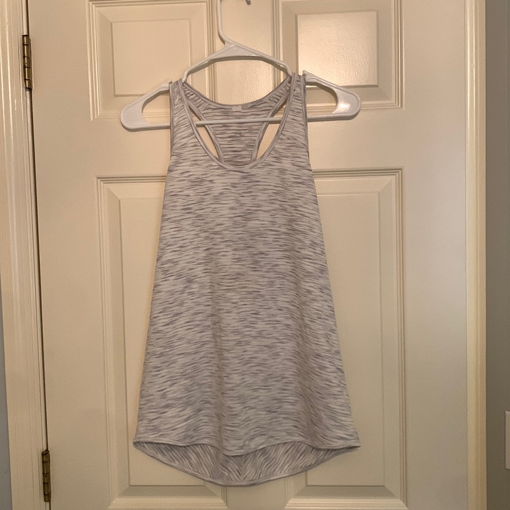 Lululemon tank top size 4. Loose fit and not cropped